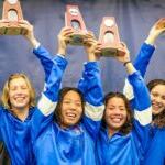 free relay team poses with trophies